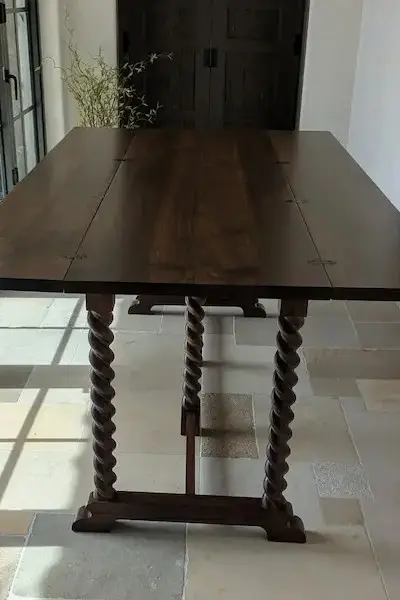 Finished barley twist table on site with open side leaves