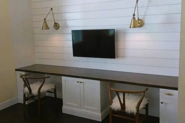 Desks with wall paneling