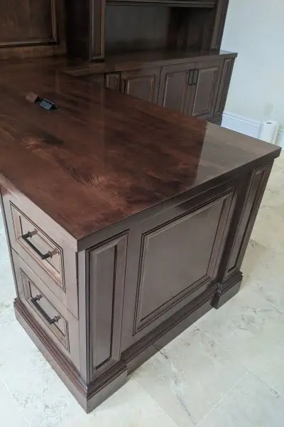 Traditional dark maple office desk with bookcase