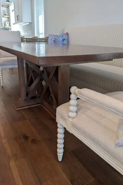 Dining table with T-foot pedestal base