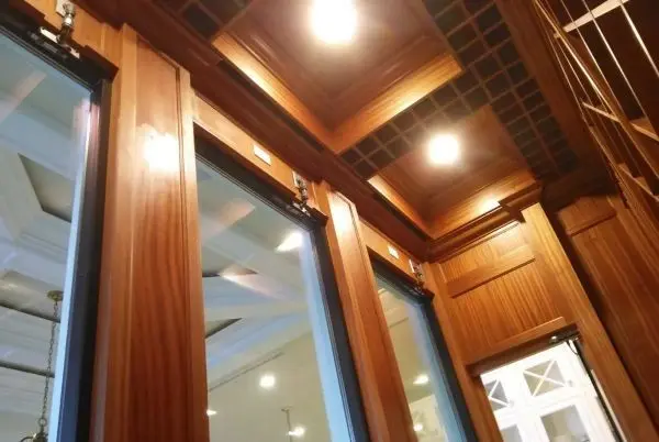 Sapele millwork in a walk-in wine cooler
