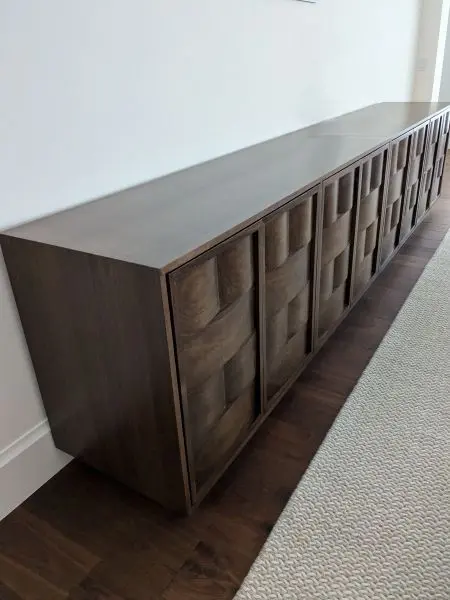 Walnut credenza with wave doors