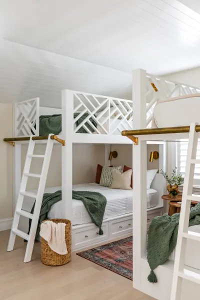 White bunks with Chippendale railings